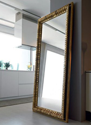 Stunning gold leaner Mirror in kitchen setting 