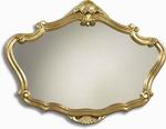 Decadently carved ornate wall mirror finished in quality gold leaf.