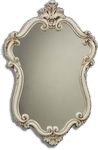 Decadently styled ornate wall mirror finished in white ivory colour.