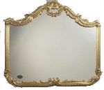 Sumptuously decadent wall mirror with a gold leaf finish