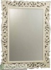 Intricately carved French style framed mirror in a White ivory finish.