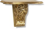 Decoratively carved support finished in quality gold leaf