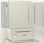 Stunning all glass triptich vanity mirror complet with added drawer.