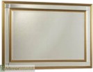 A cross between traditional and modern with Gilt edging to a mirrored frame.