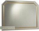 A cross between traditional and modern with Gilt edging to a mirrored frame. with canted corners