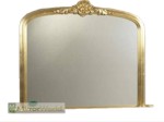 Decorative tradition overmantle with intricately carved head piece, in a quality gold leaf finish. Plain mirror