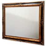A truly individual piece for the discerning eye. One of our best selling designs, Beautifully ostentatious in black and gold. Comes with a bevelled mirror