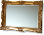Intricate and hand-carved Stunning Ornate Swept Frame with bevelled mirror, combining massive proportions with a craftsmanship rarely found.