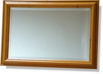 Broad antiqued pine frame with bevelled mirror. Available in many sizes.