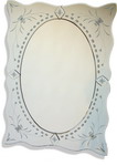 Elaborate all glass mirror in sought after oval set in a rectangle Venetian style