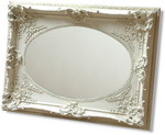 Ornate Cream plaster effect swept frame with intricate detail and oval Centre