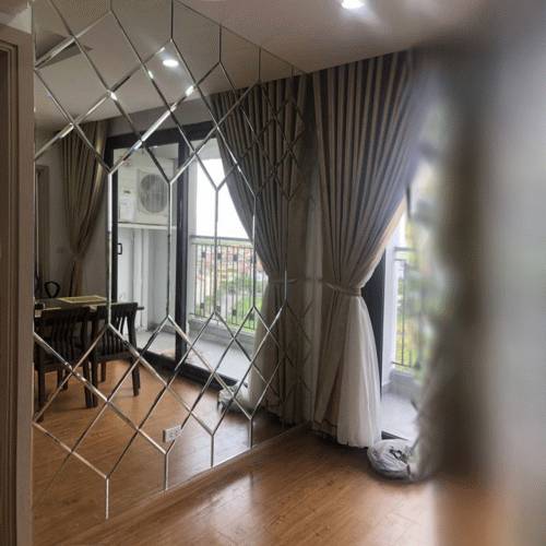Bevelled mirror tile feature wall bevelled mirror tiles fitted as a decorative feature wall panel