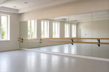 Ballet studio mirrors fitted above a barre