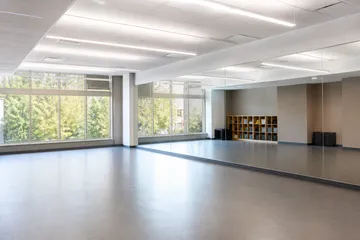 Performing arts school room with mirrored wall